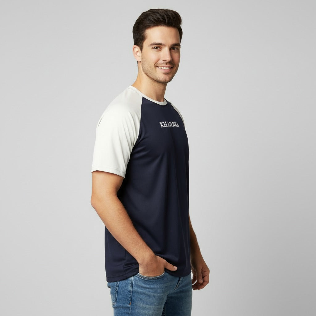 Men wearing a navy and white polyster t shirt with 'Khambrasports' branding on a gray background