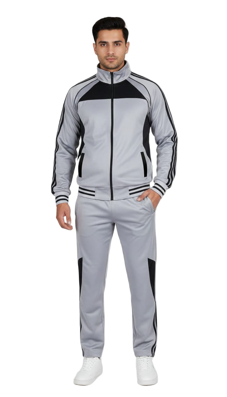 Man wearing a gray and black tracksuit on a white background