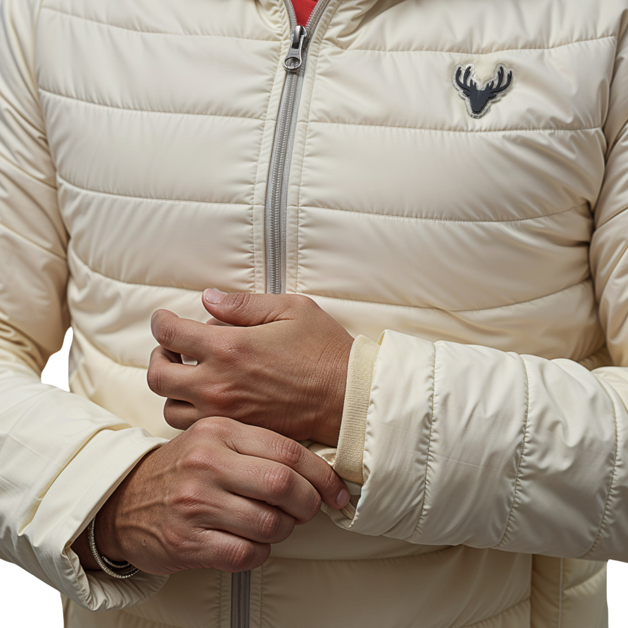 hood drawstrings and embroidered deer logo on cream jacket