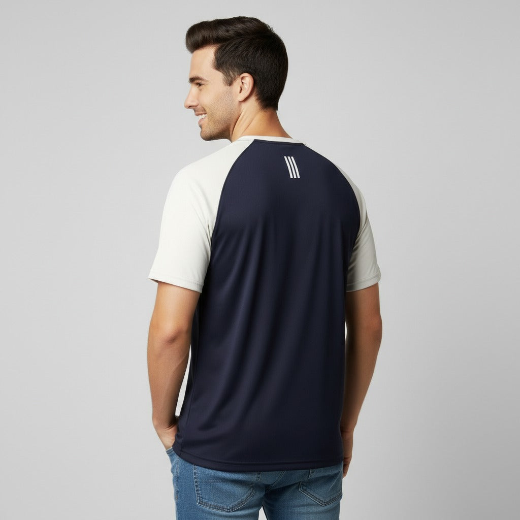 Men wearing a navy and white gym wear tee shirt with reflector stripes on back neck on a gray background