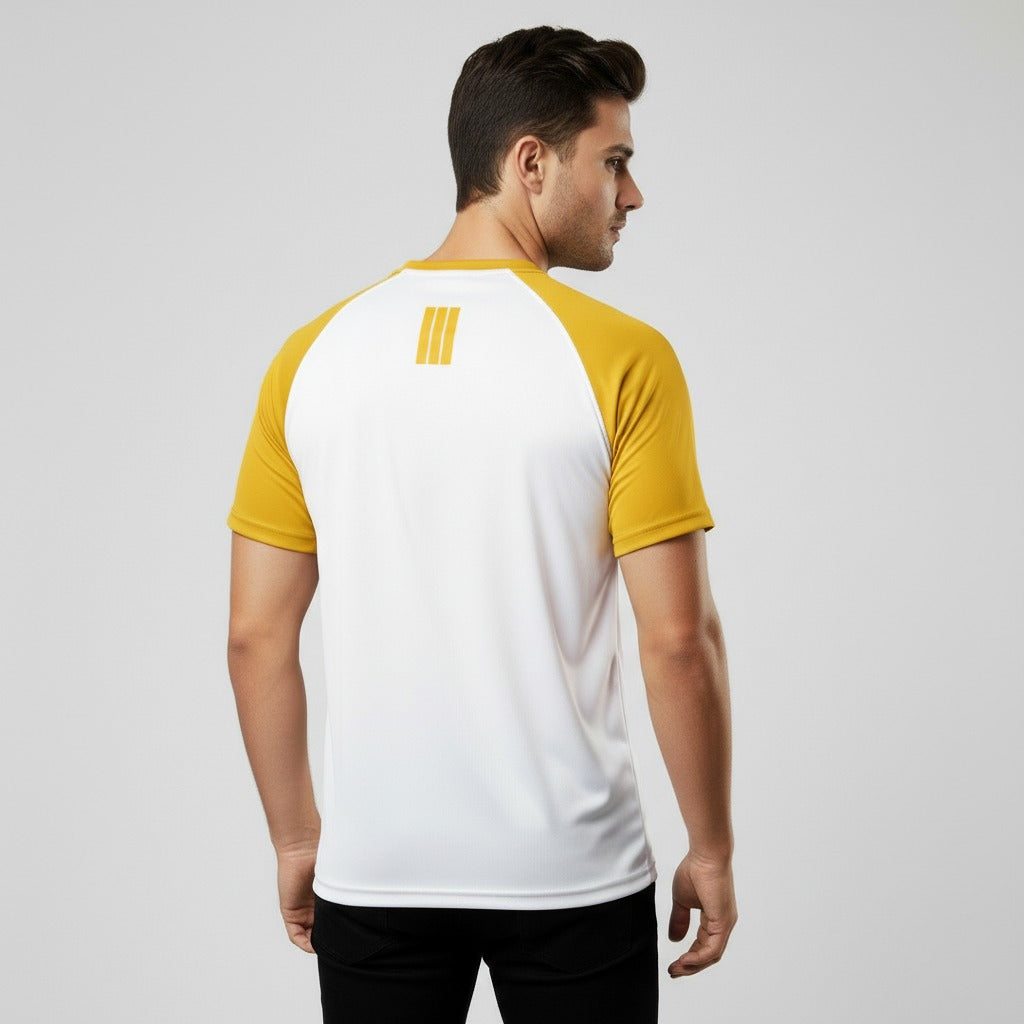 Man wearing a white and yellow activewear t shirt on a light gray background